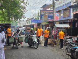 Polres Langkat Gelar Bakti Sosial Kebersihan di Pasar Baru Stabat Sambut Hari Bhayangkara Ke-79