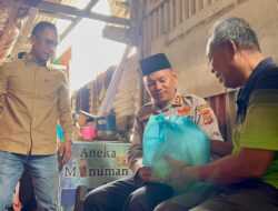 Kapolres Pelabuhan Belawan Beri Bantuan Sembako Untuk Warga Terdampak Banjir Rob