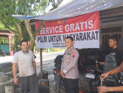 Jajaran Polresta Deli Serdang Buka Bengkel Service Gratis Untuk Sepeda Motor Warga Yang Terendam Banjir